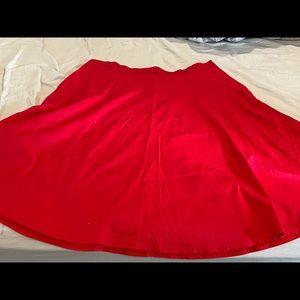 Red skirt. Coordinating shirt available but sold separately